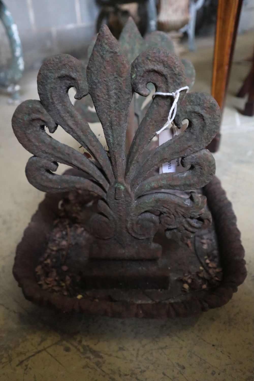 A 19th century cast iron anthemion boot scraper, width 38cm
